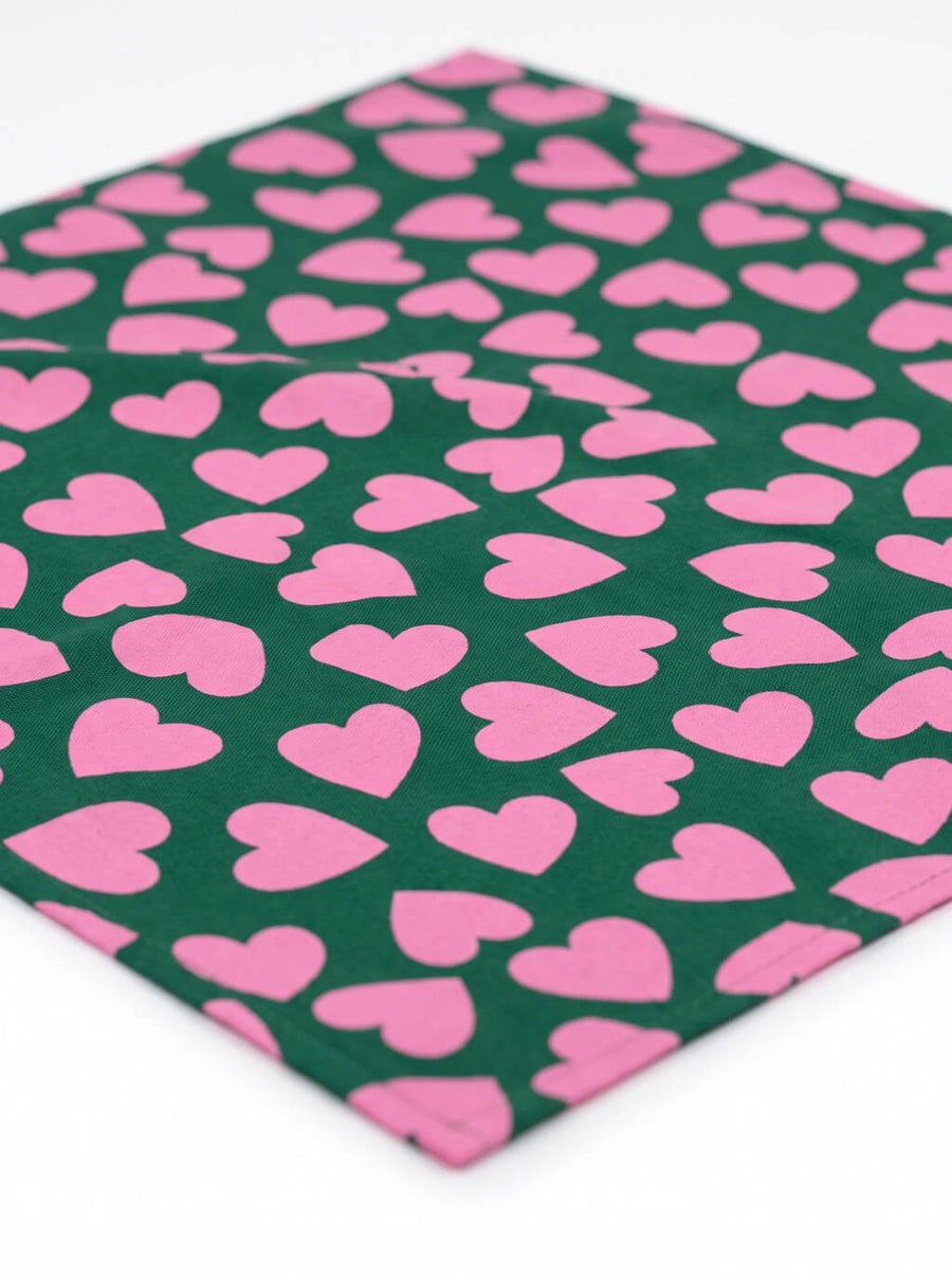 Close up of the print on the green Valentine's Day Dog Bandana from WOOF