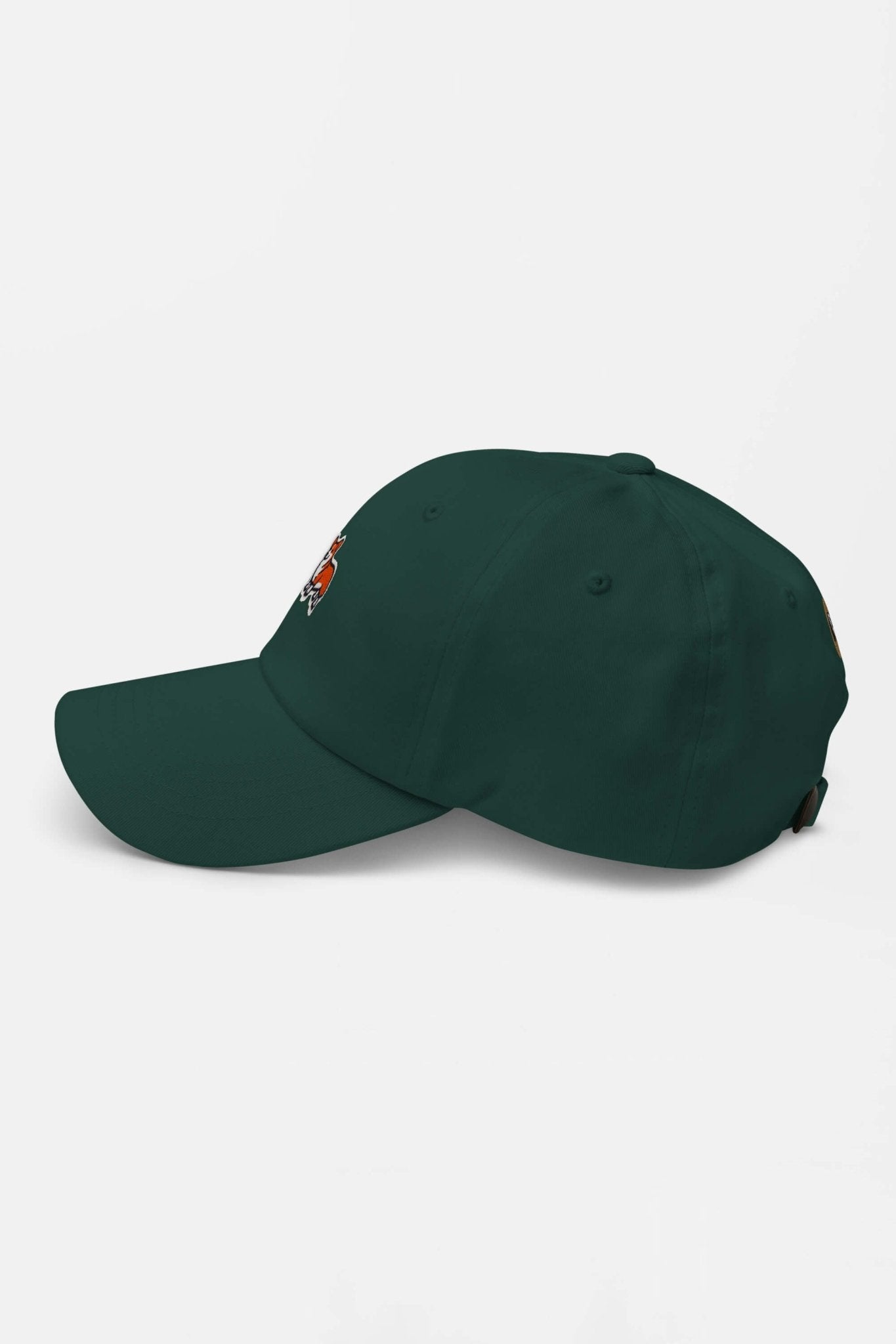 The Iconic Corgi Cap by Dogloverclothing.com is a dark green cap with a curved brim, side view, featuring a small embroidered design on the front and an adjustable strap—ideal for showing off your Corgi’s cuteness.