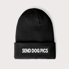 The Send Dog Pics Unisex Beanie from Dogloverclothing.com is a black knit hat for dog lovers, embroidered with SEND DOG PICS in white on the folded brim, against a plain light gray background.