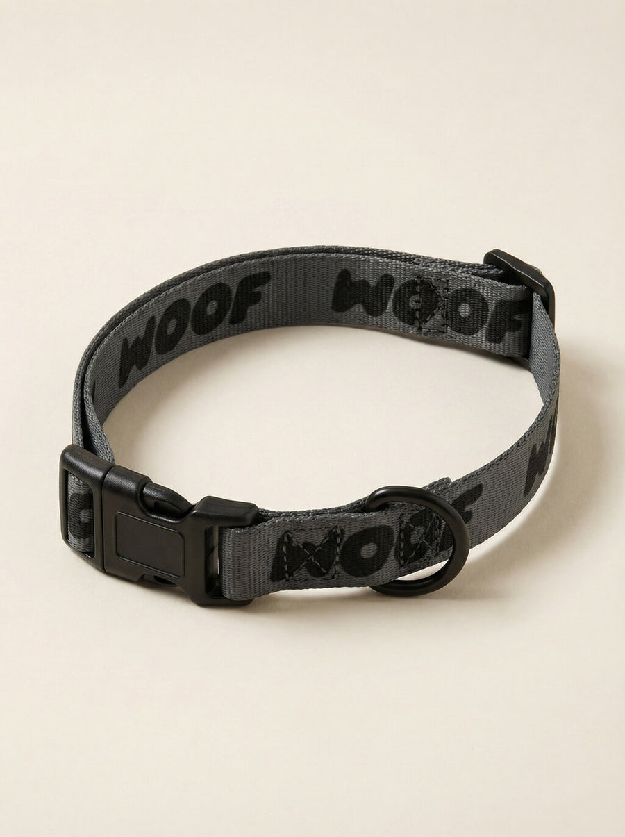 All black WOOF dog collar shown on its own