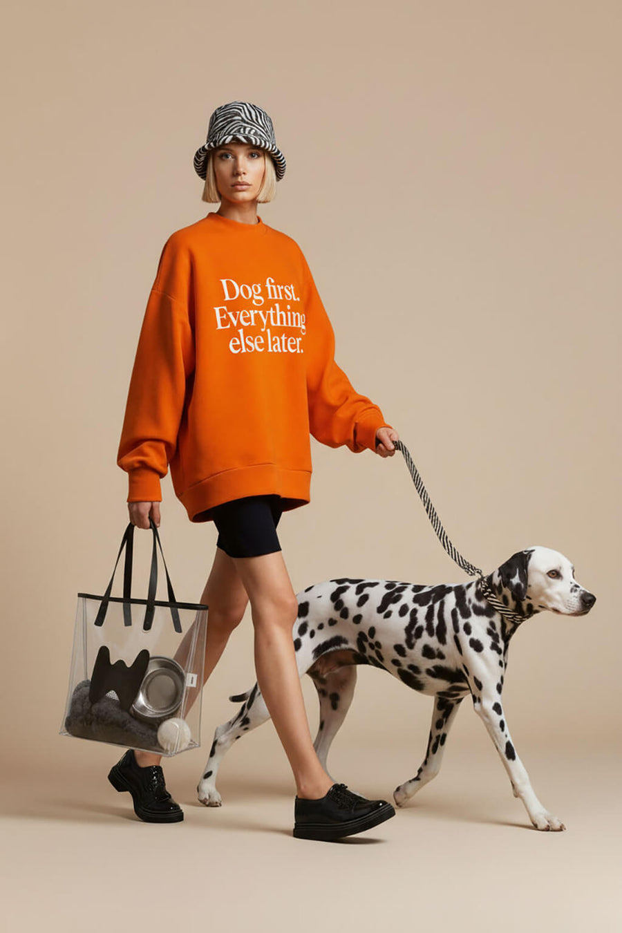 Clear WOOF tote bag shown with the handles up