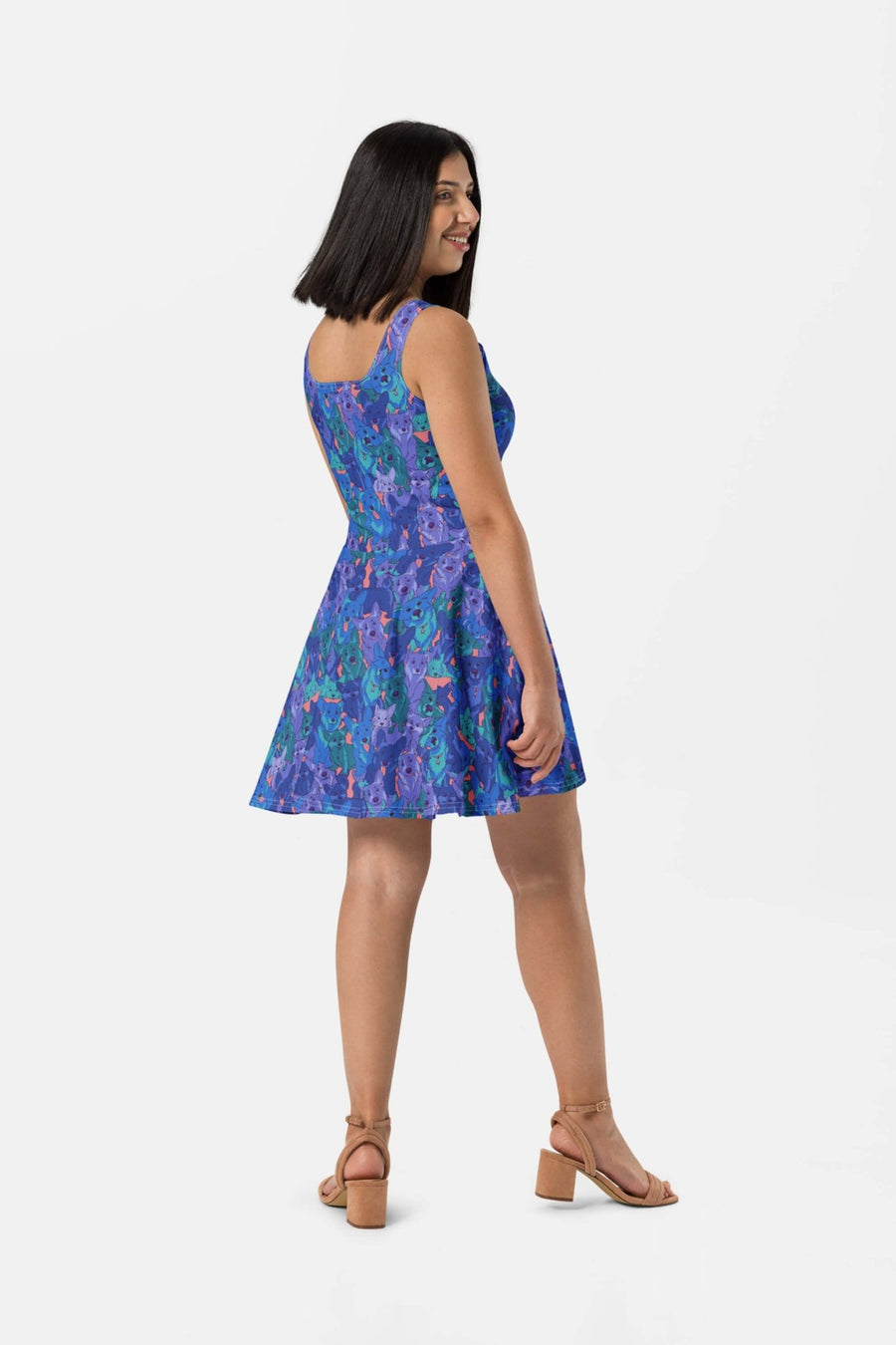 Side view of the Sapphire Corgi Collage Skater Dress from WOOF