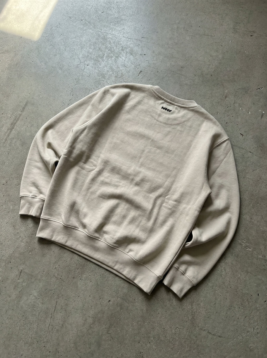 Back view of the beige Embroidered Corgi Sweatshirt from WOOF