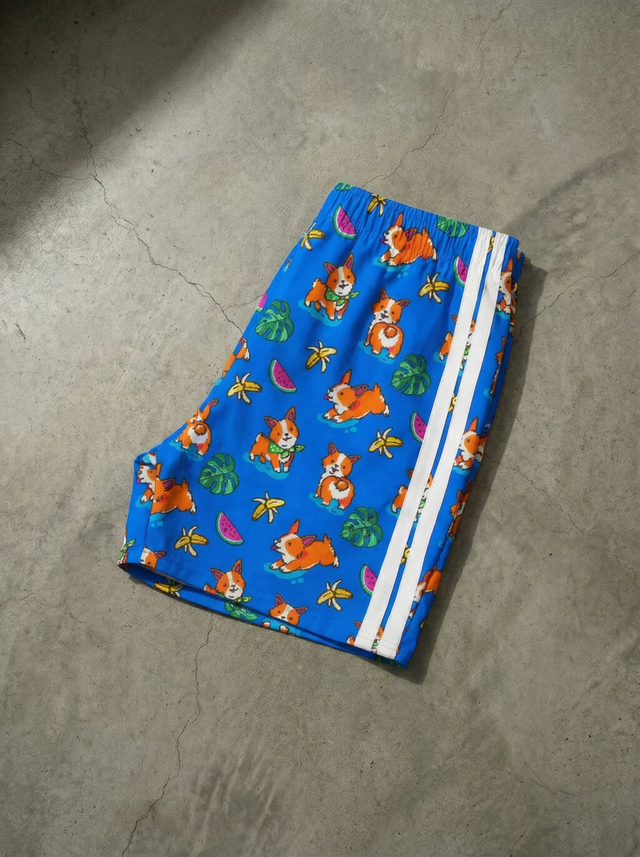 Side view of the Tropical Corgi Beach Party swim shorts from WOOF