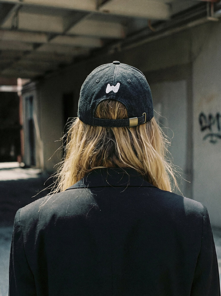 Back of the black Dachshund denim cap from WOOF with the adjustable strap