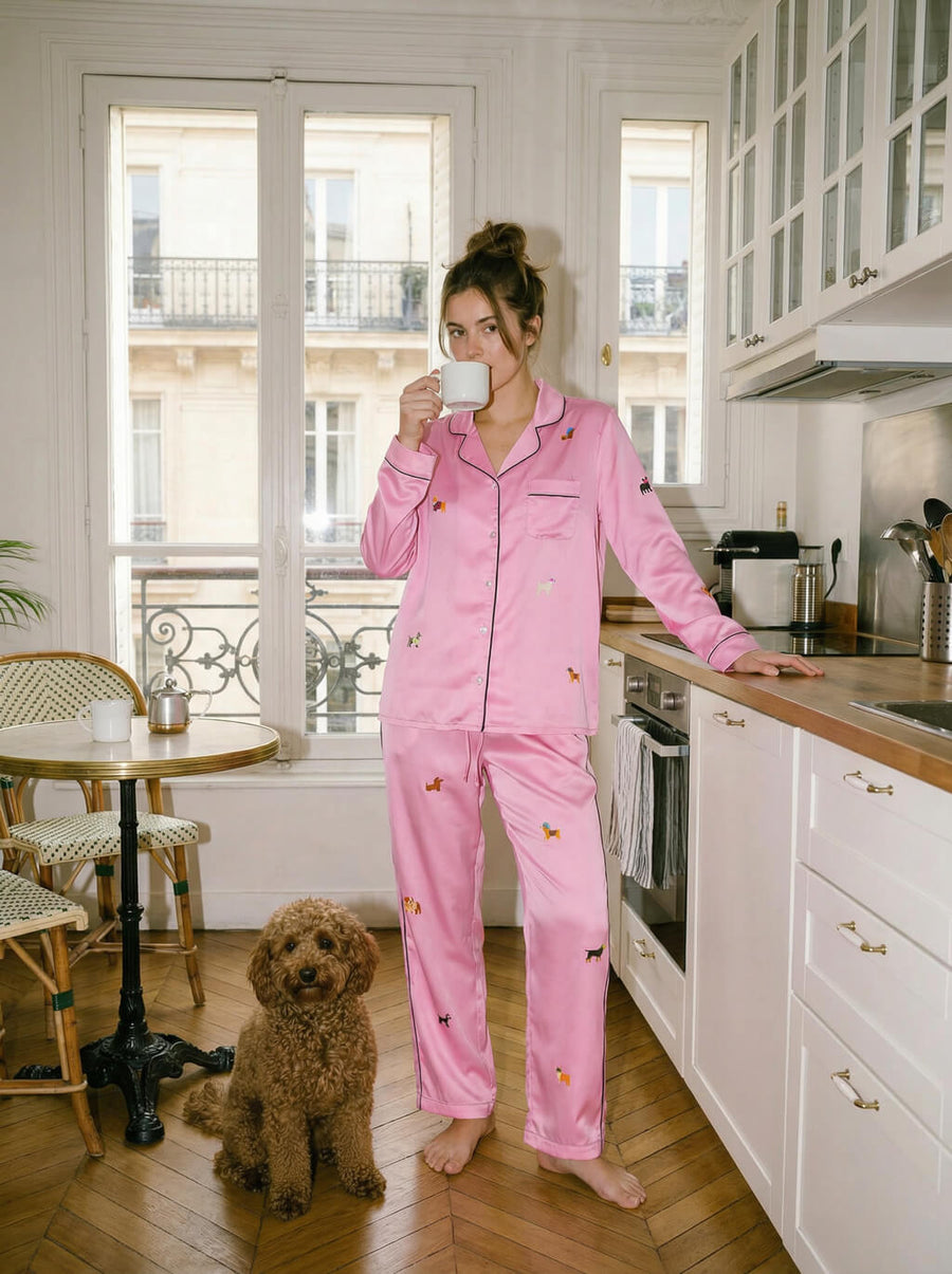 Pink dog love pajama set from WOOF worn straight on