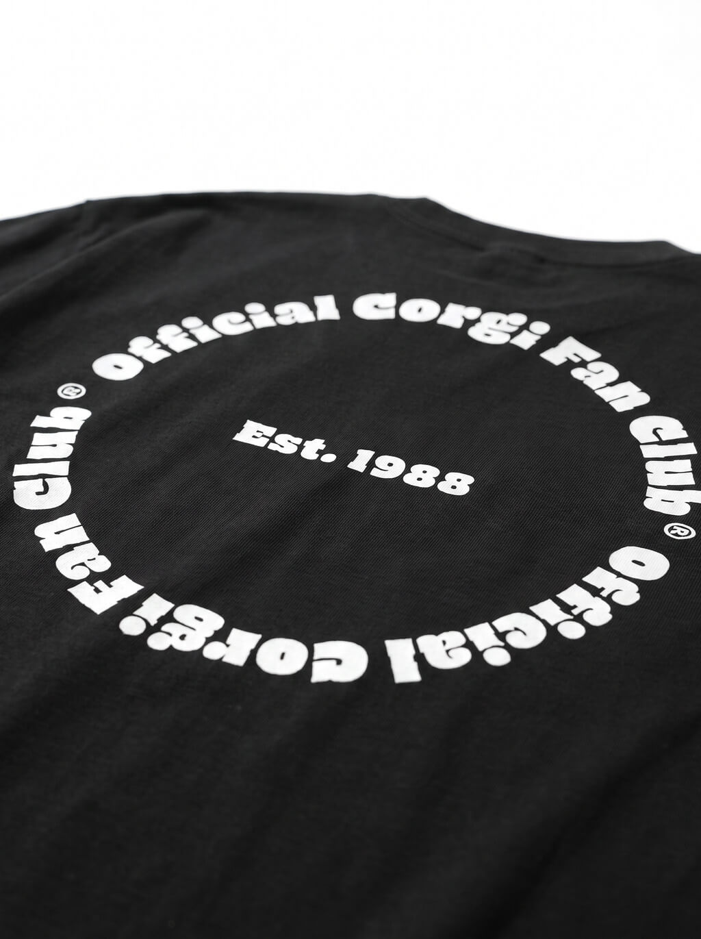 Close up of the back print on the black Official Corgi Fan Club T-Shirt from WOOF