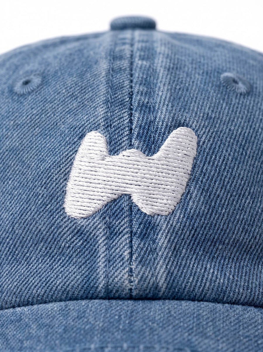 Stitching detail on the Dachshund Embroidered Denim Cap from WOOF