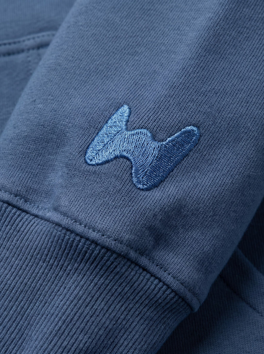 Fabric detail on the blue Dog Mom Hoodie from WOOF