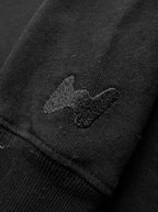 Fabric detail on the black Dog Mom Sweatshirt from WOOF