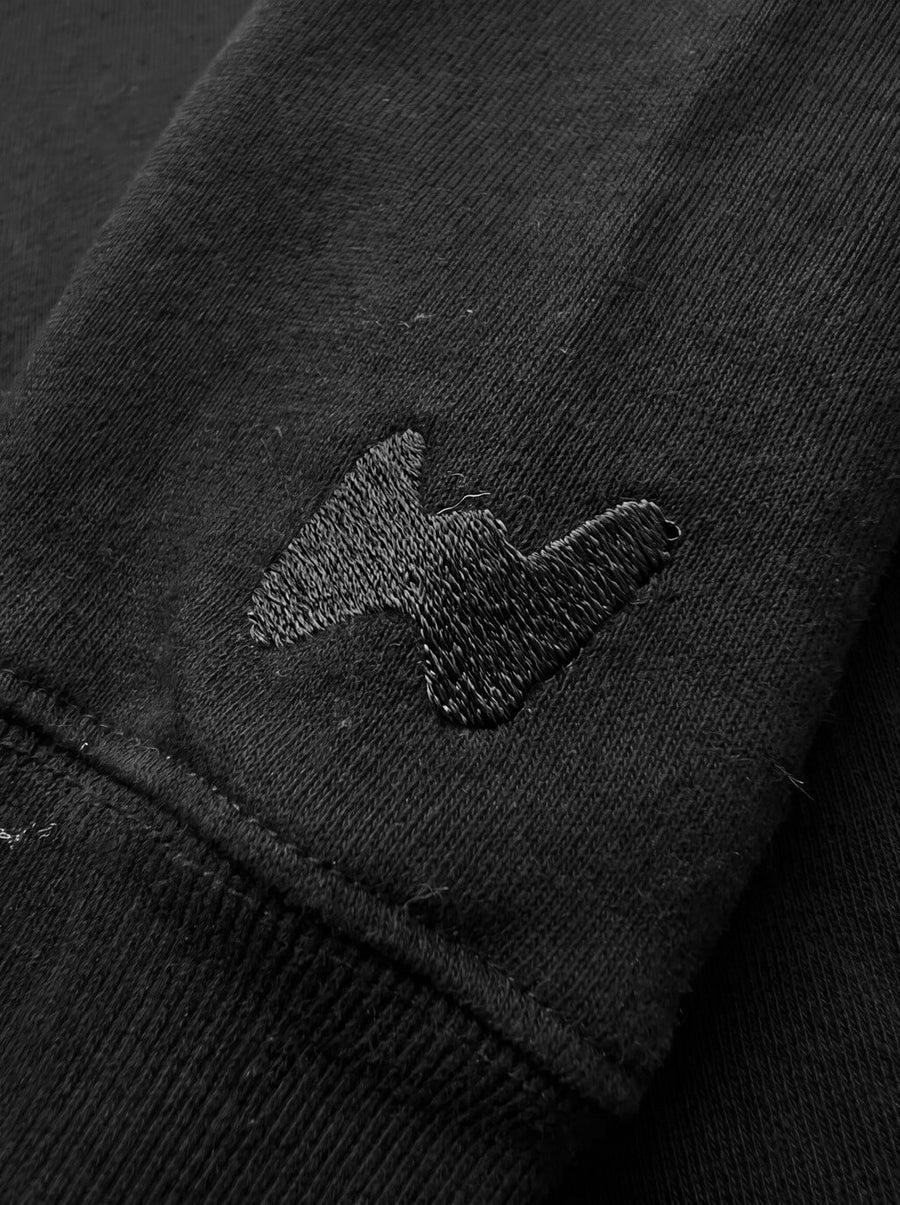 Fabric detail on the black Dog Mom Sweatshirt from WOOF