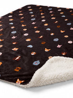 Sherpa backing detail on the black Doggy Dreams Dog Blanket from WOOF