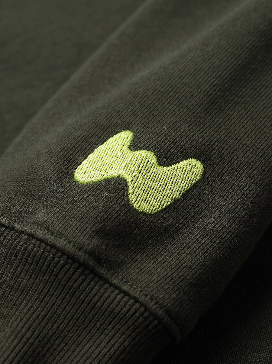 Fabric detail on the green Lazy Sundays Frenchie Hoodie from WOOF