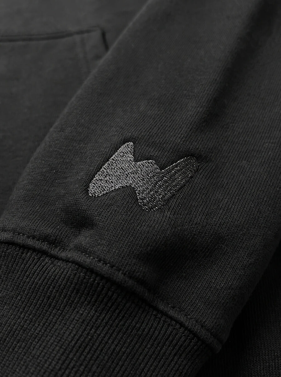 Fabric detail on the black My Dog And I Talk Embroidered Hoodie from WOOF