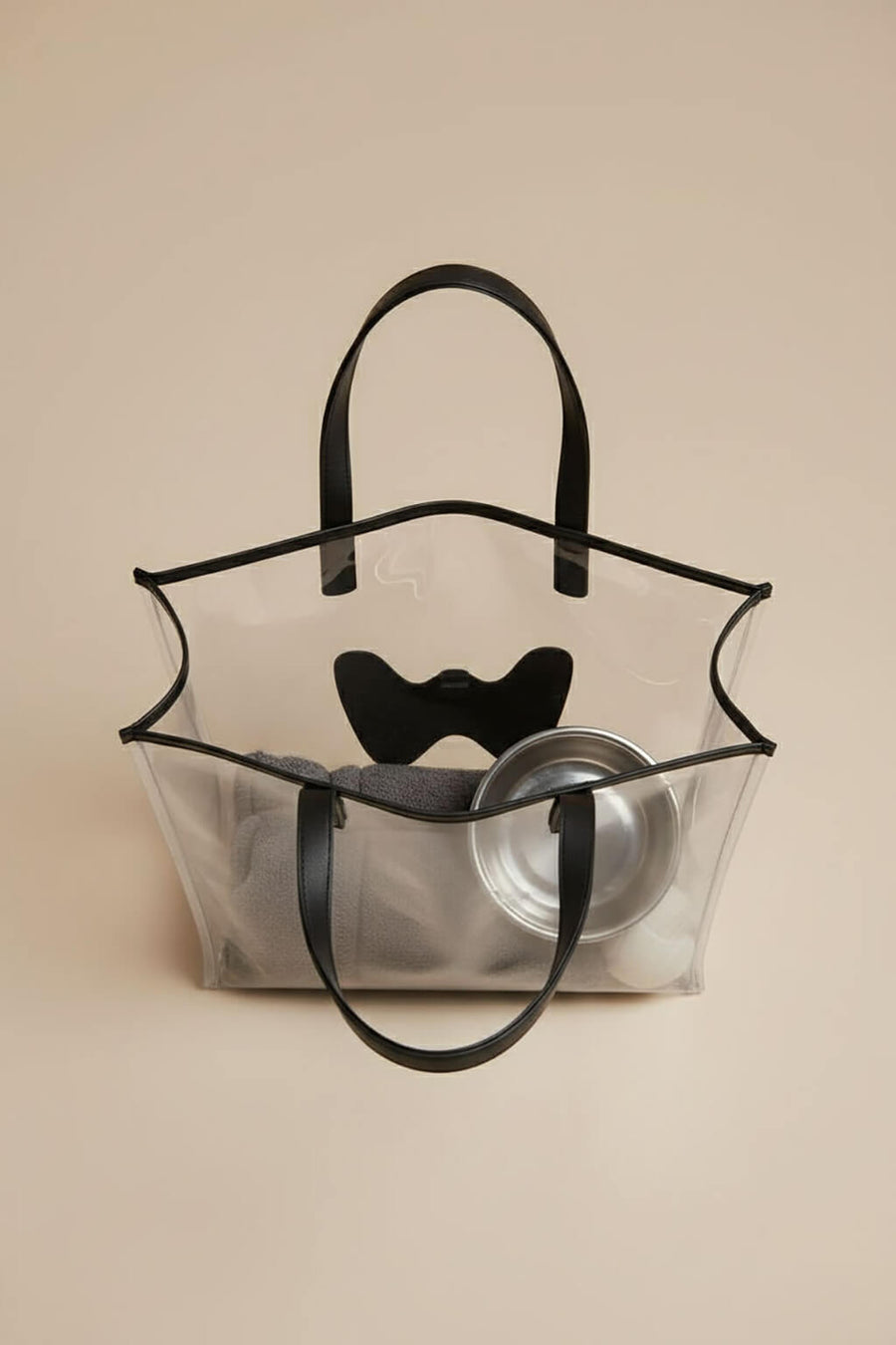 Close up of the logo print on the clear WOOF tote bag