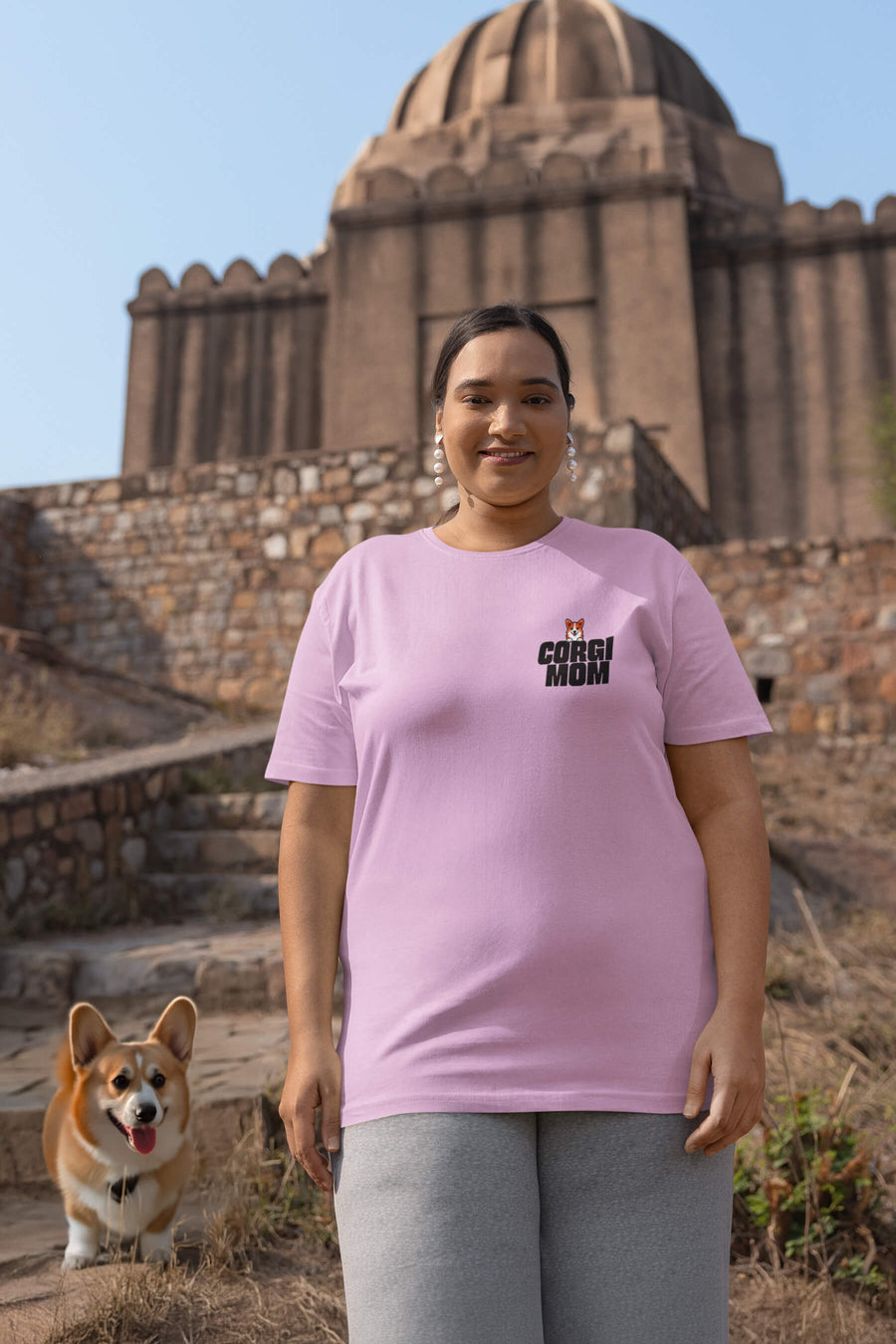 Model wearing the lilac Corgi Mom Premium T-Shirt from WOOF
