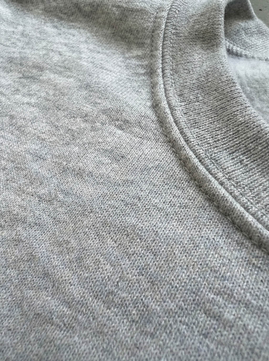 Embroidery and fabric detail on the Dog Person Sweatshirt from WOOF