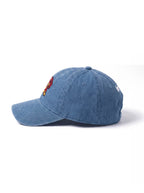 Side view of the Dachshund Embroidered Denim Cap from WOOF