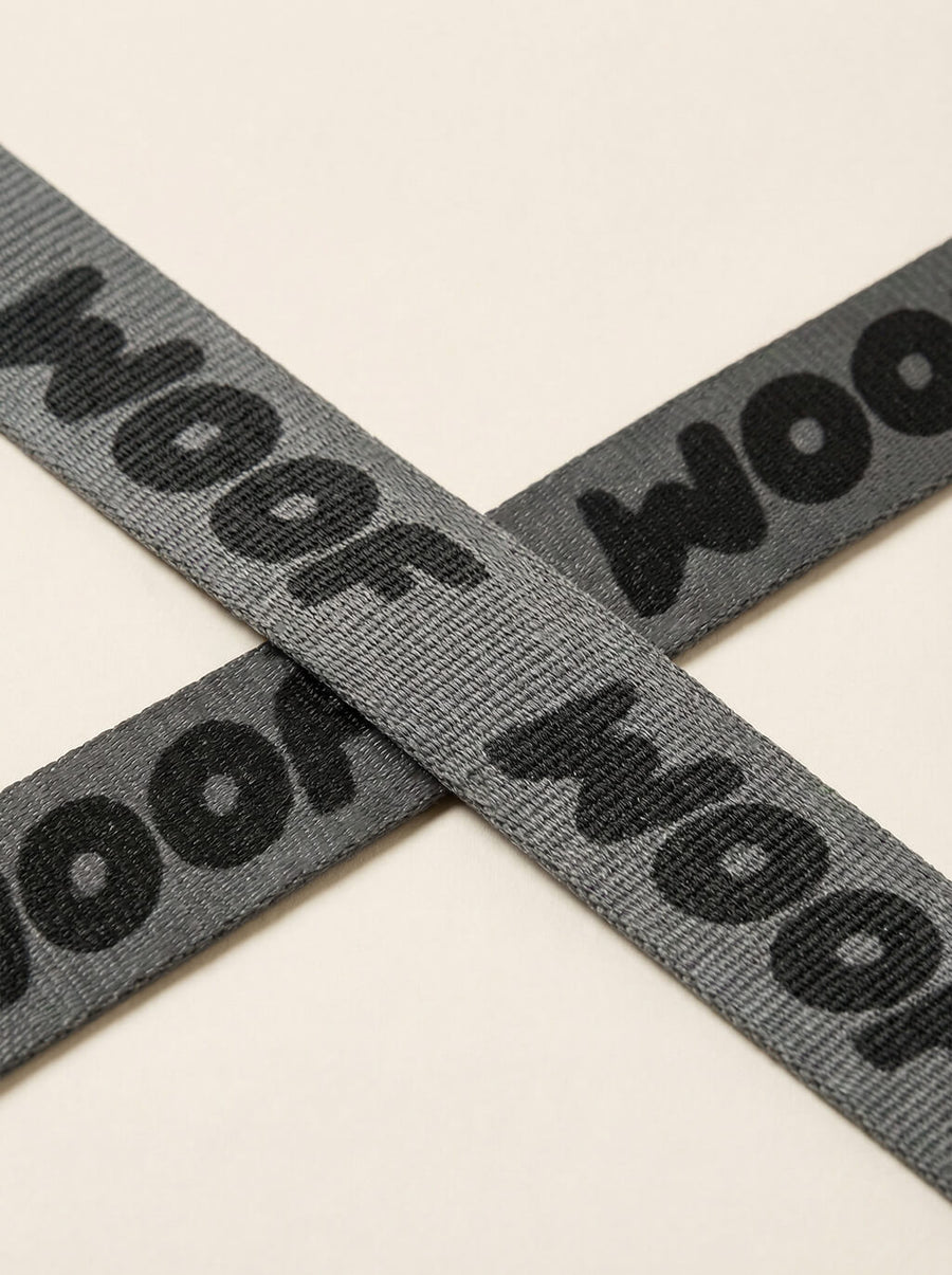 Leash handle detail on the all black WOOF set