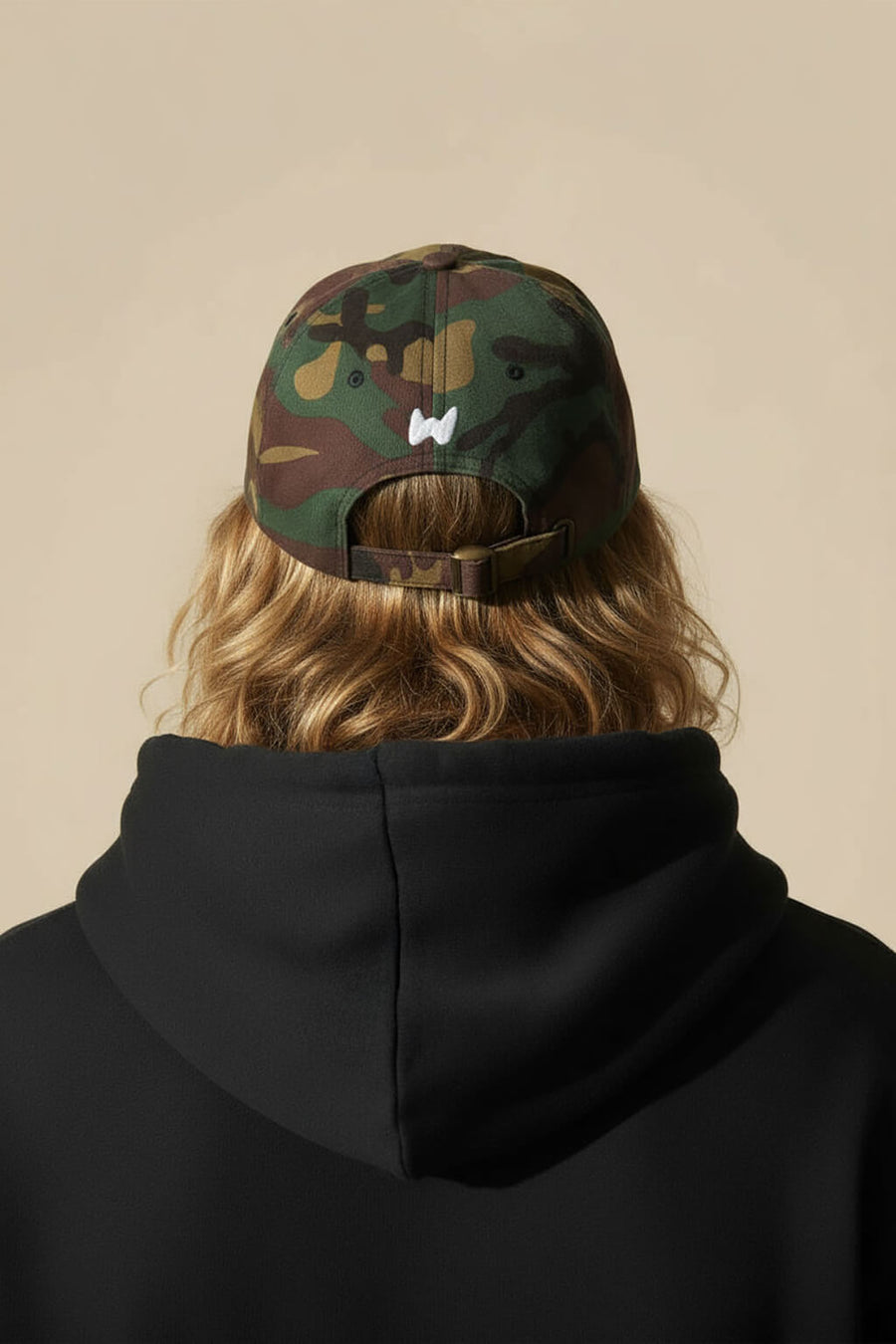 Back of the camo Iconic Corgi Baseball Cap from WOOF with the adjustable strap