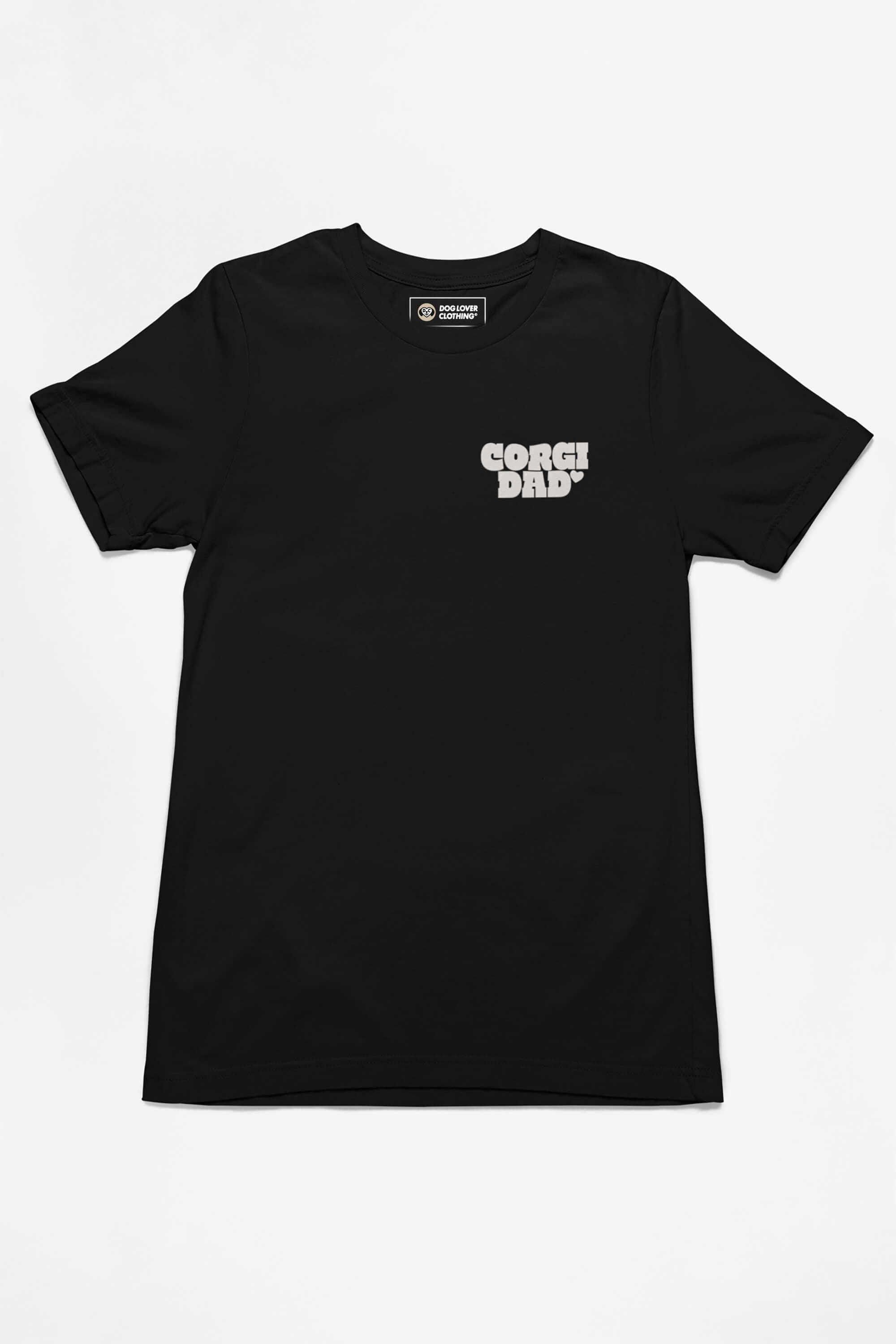 The Corgi Dad Ultimate Tribute T-Shirt from Dogloverclothing.com features a striking upper-left white design on black smooth fabric and offers a unisex fit, ideal for dog lovers who appreciate simple, casual styles for everyday wear.