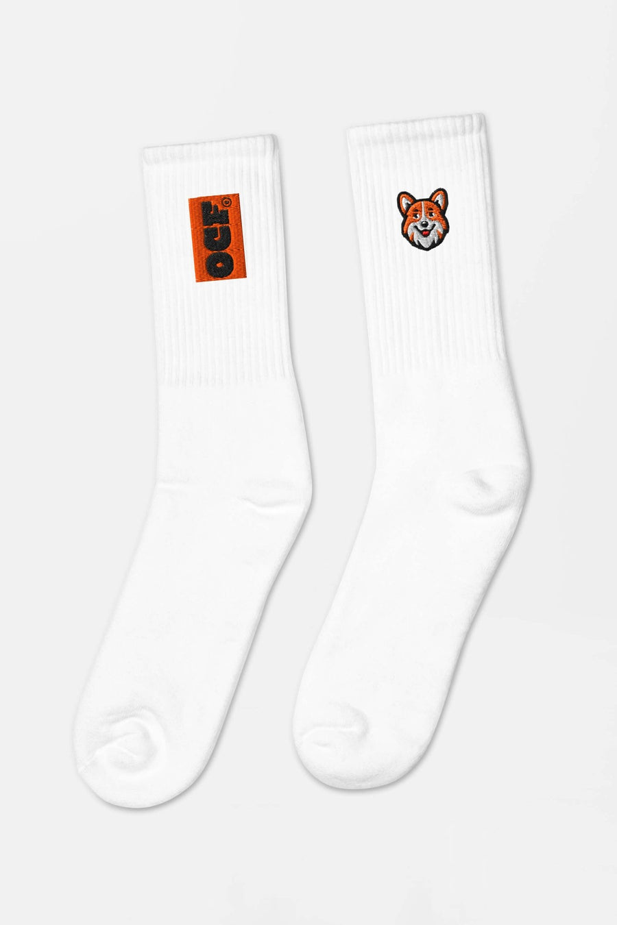 White SOCCO x Corgi Fan Club socks from WOOF shown as a mixed pair