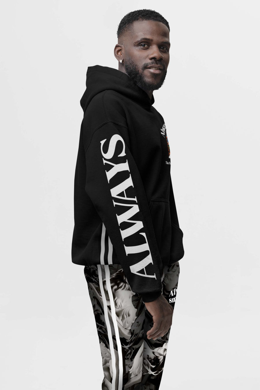 Left side view of the black Corgi Supreme Tribute Hoodie from WOOF with ALWAYS on the sleeve
