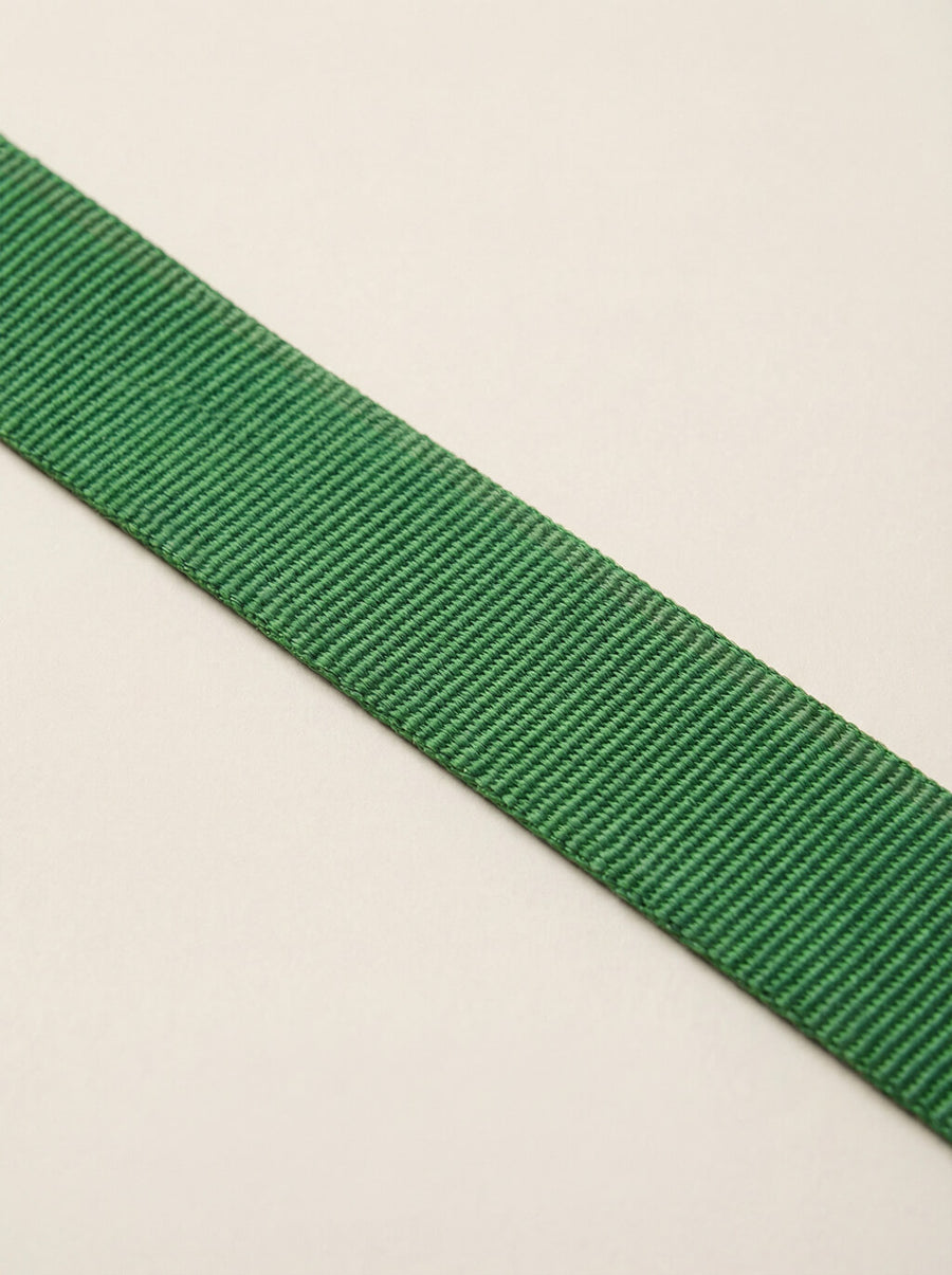 Leash handle detail on the deep green set from WOOF