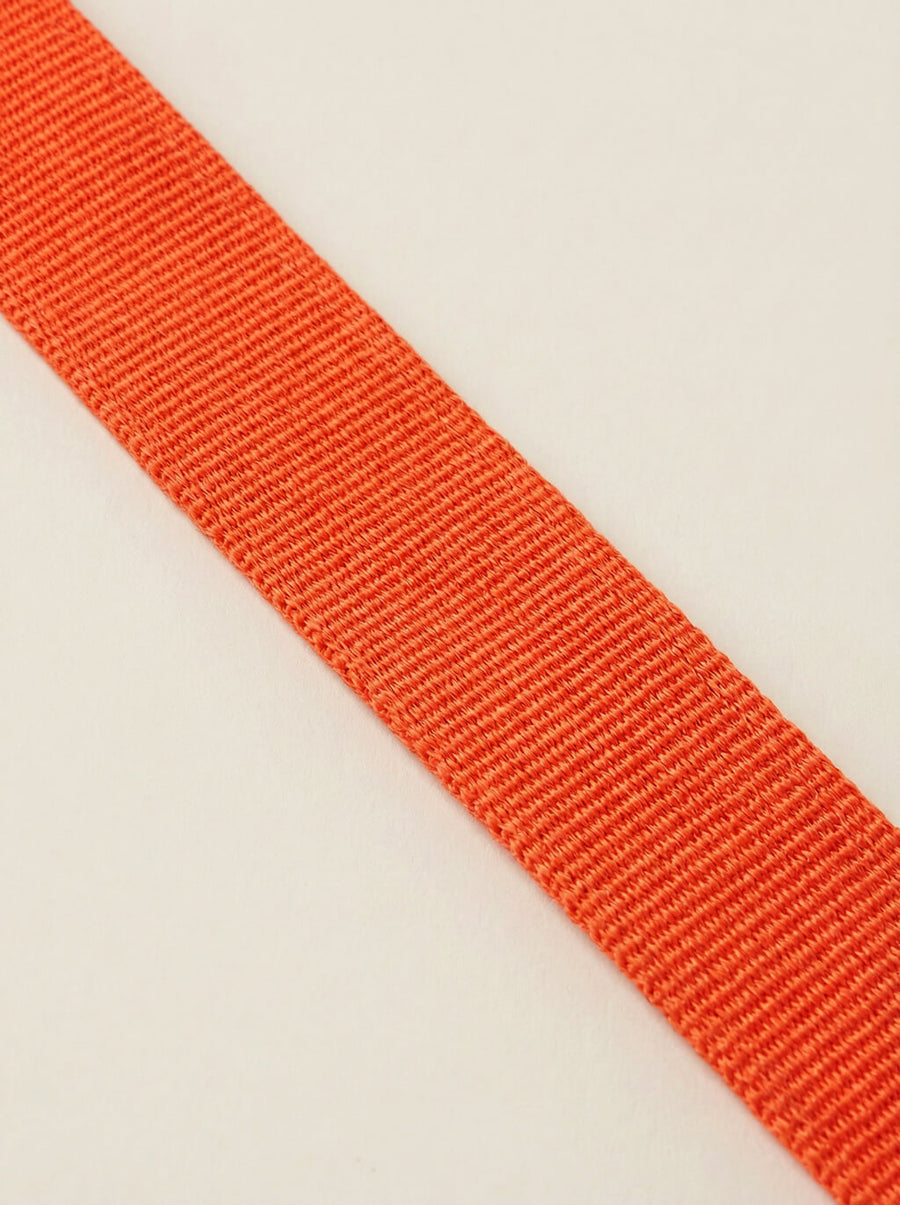 Leash handle detail on the neon orange set from WOOF