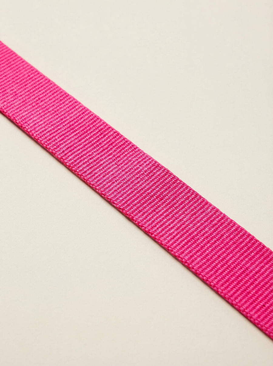 Leash handle detail on the neon pink set from WOOF