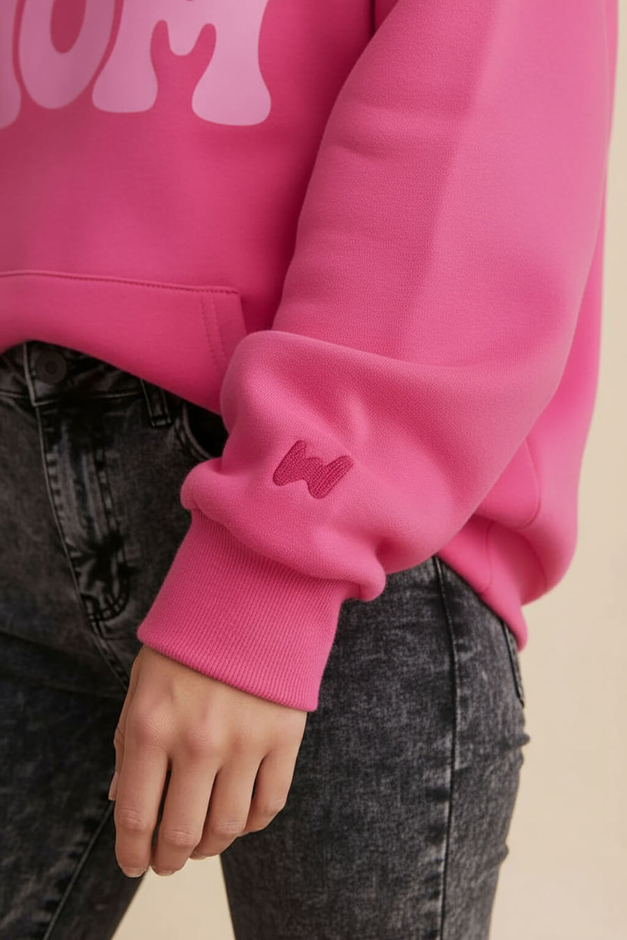 Print detail on the pink Dog Mom Hoodie from WOOF