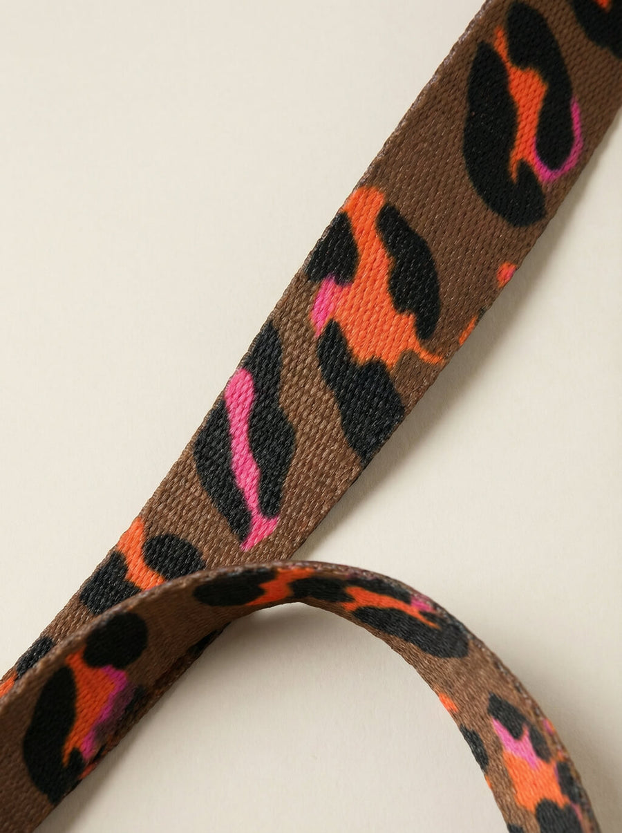 Leash handle detail on the leopard print set from WOOF