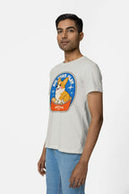 A person models the Best Dog Supreme Tribute Unisex T-Shirt by Dogloverclothing.com. Crafted from premium cotton, it features a cartoon Corgi design with Dog-Taxy Co. Best Dog text. Paired with light blue jeans against a white background, its perfect for dog lovers.