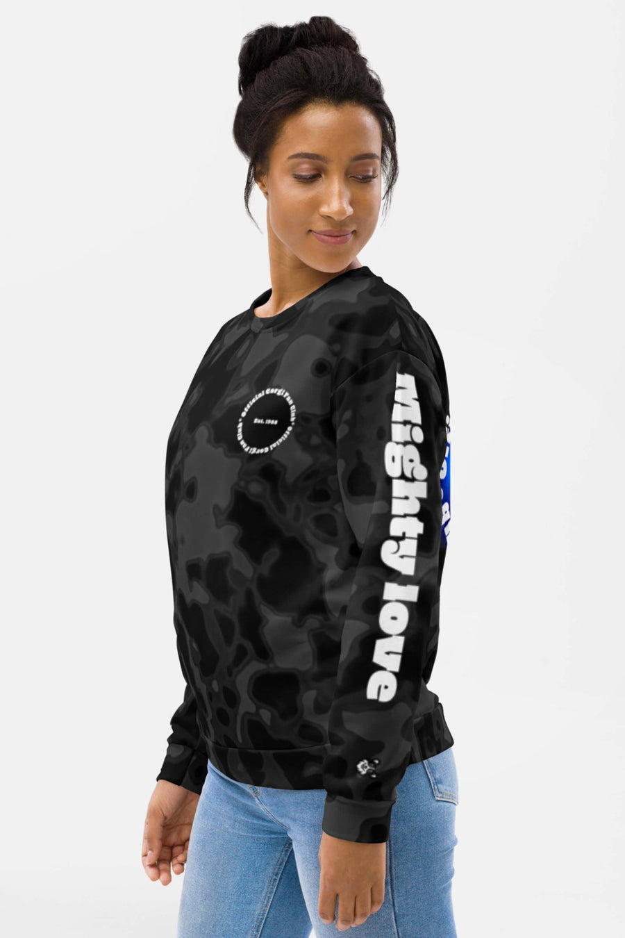 Woman in the Corgi Fan Club Elite Camo Sweatshirt from WOOF with blue jeans, side view