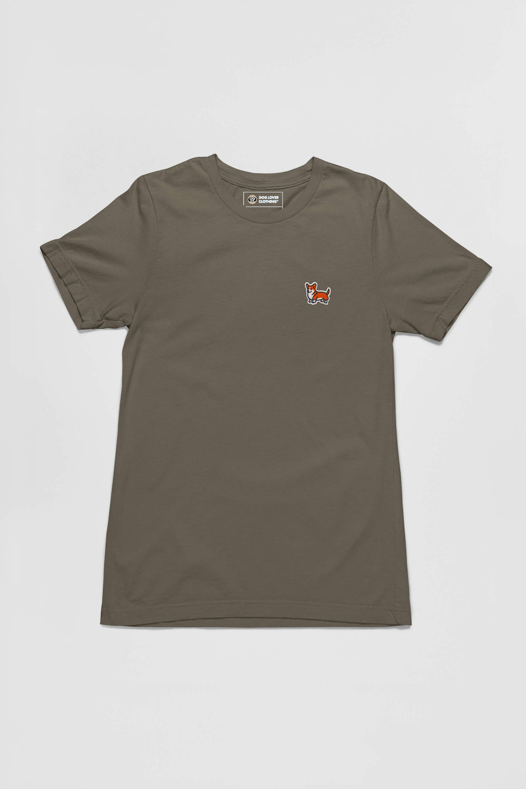 The Corgi Tail Wagger Unisex T-Shirt by Dogloverclothing.com is olive green and features a small, colorful embroidered long-tailed Corgi patch on the left chest. Perfect for Corgi enthusiasts, it is displayed flat against a plain white background.