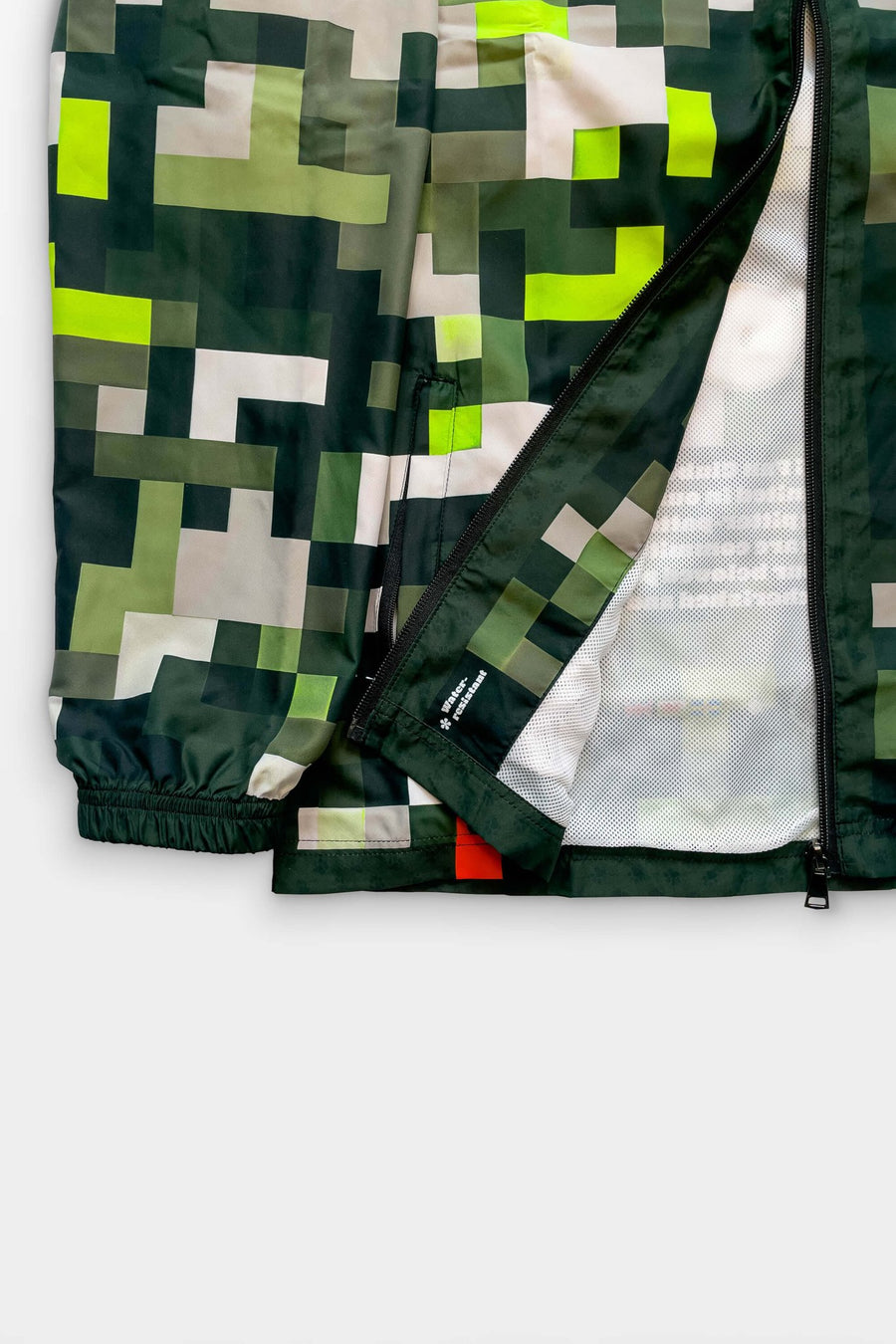 Pocket and drawcord detail on the Dogwalker Rain Jacket from WOOF
