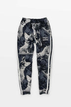 The Corgi Supreme Tribute Joggers from Dogloverclothing.com are black with a repeated wolf design and Always Smiling text on the upper left. Made from recycled materials, they feature white side stripes for a stylish, sustainable look.