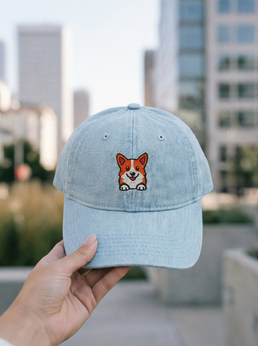 Light blue denim Iconic Corgi Cap from WOOF on a plain background