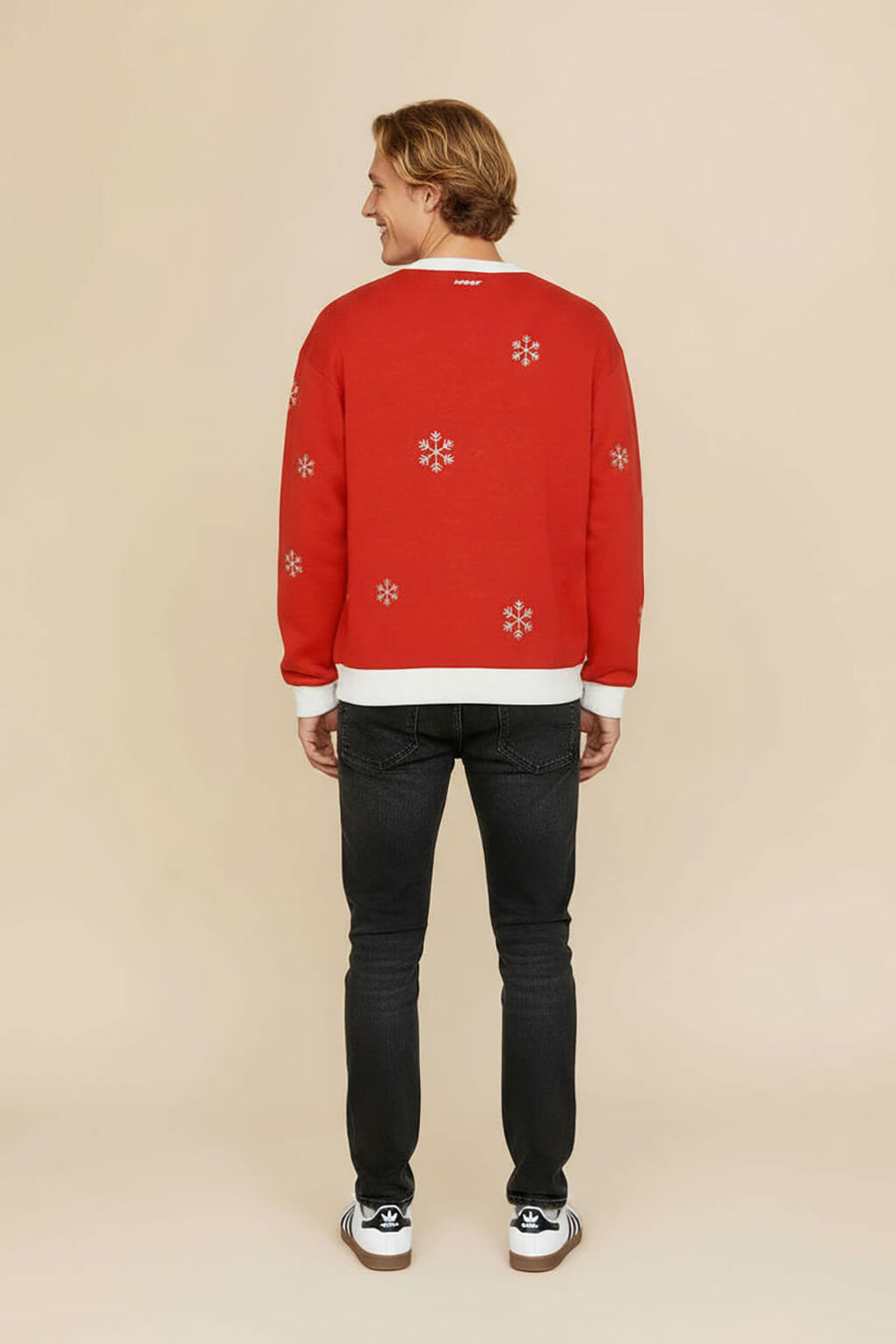 Knitted pattern on the back of the Corgi Christmas sweater from WOOF