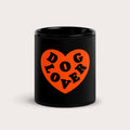 The Dog Lover Mug from Dogloverclothing.com is a black mug with a large orange heart featuring DOG LOVER in bold, celebrating everything dog-themed.