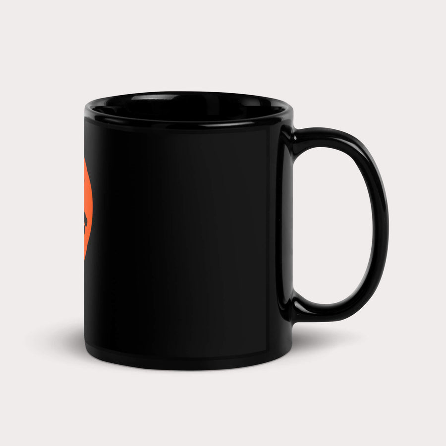 Black ceramic Dog Lover Mug from WOOF with a partial orange circle graphic