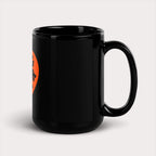 The Dogloverclothing.com Dog Lover Mug is a black ceramic mug with a glossy finish, showcasing an orange graphic of a sprinting black dog silhouette. Set on a plain white backdrop, its perfect for any collection of dog-themed items.
