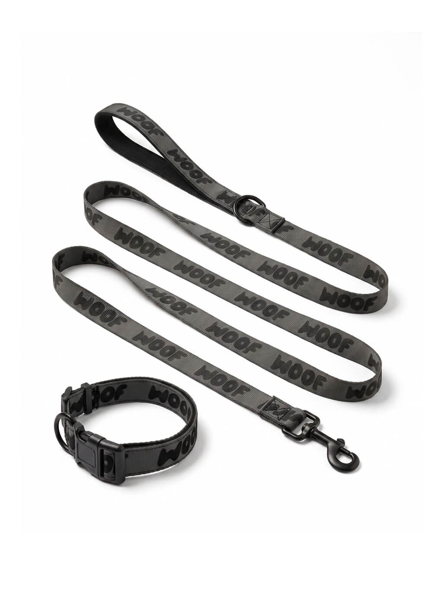 All black WOOF dog collar and leash set, front view