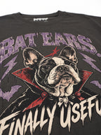 Close-up of the "Bat Ears – Finally Useful" print with a vampire French Bulldog on the Washed Black tee