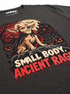 Close-up of the "Small Body. Ancient Rage." print with a Chihuahua in a haunted graveyard on the Washed Black tee