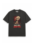 Chihuahua Halloween oversized T-shirt in Washed Black featuring a Chihuahua in a haunted graveyard, front view