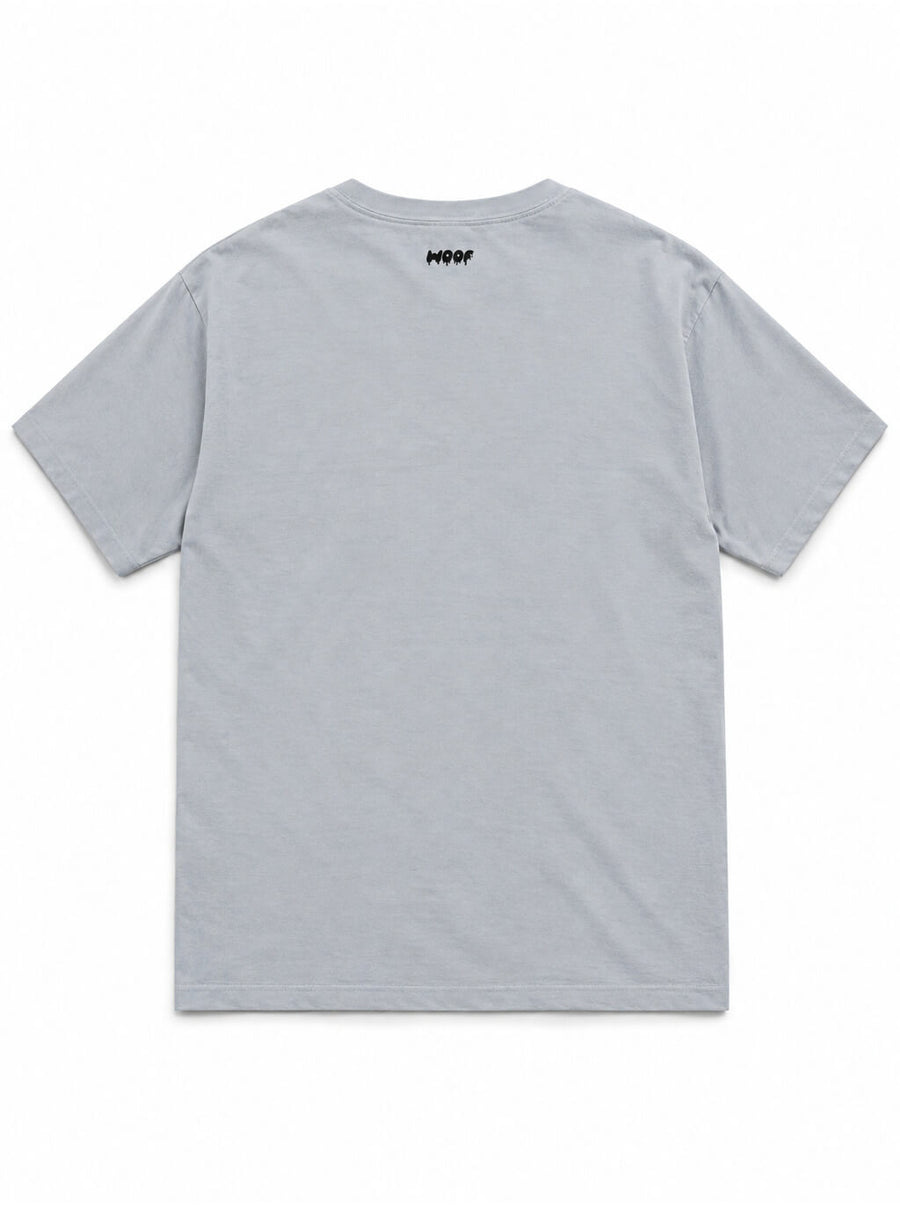 Back of the Corgi Butts Halloween oversized T-shirt in Light Washed Denim with small WOOF logo below the collar