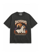 Dachshund Halloween oversized T-shirt in Washed Black featuring a Dachshund ghost with a haunted house, front view