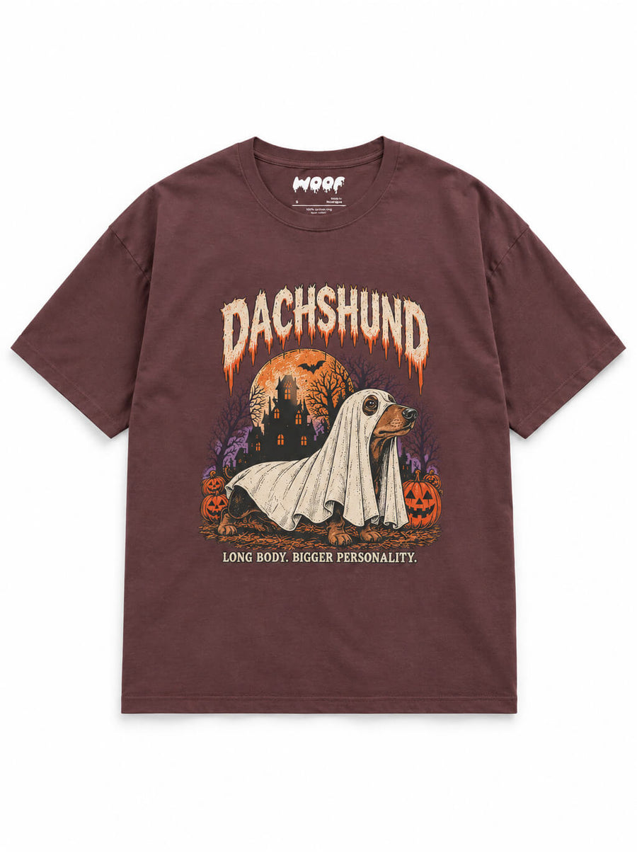 Dachshund Halloween oversized T-shirt in Washed Maroon featuring a Dachshund ghost with a haunted house, front view