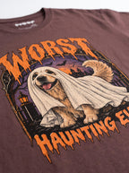 Close-up of the "Worst Haunting Ever" print with a Golden Retriever in a ghost sheet on the Washed Maroon tee